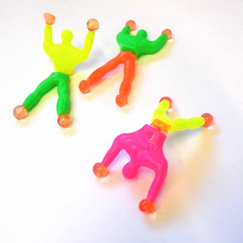 sticky toys crawl down wall